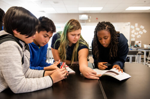 A group of young people in a classroom