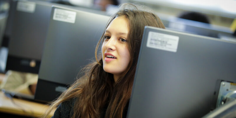 A young person in a university 人与马性视频 classroom.