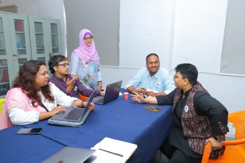 A group of people from the 老湿机69福利区无码 at the Coding Academy in Telangana.